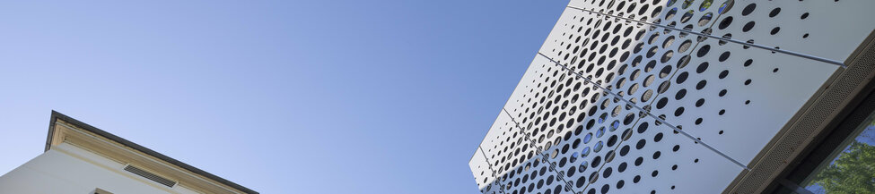 Exterior view of the institute with lots of blue sky